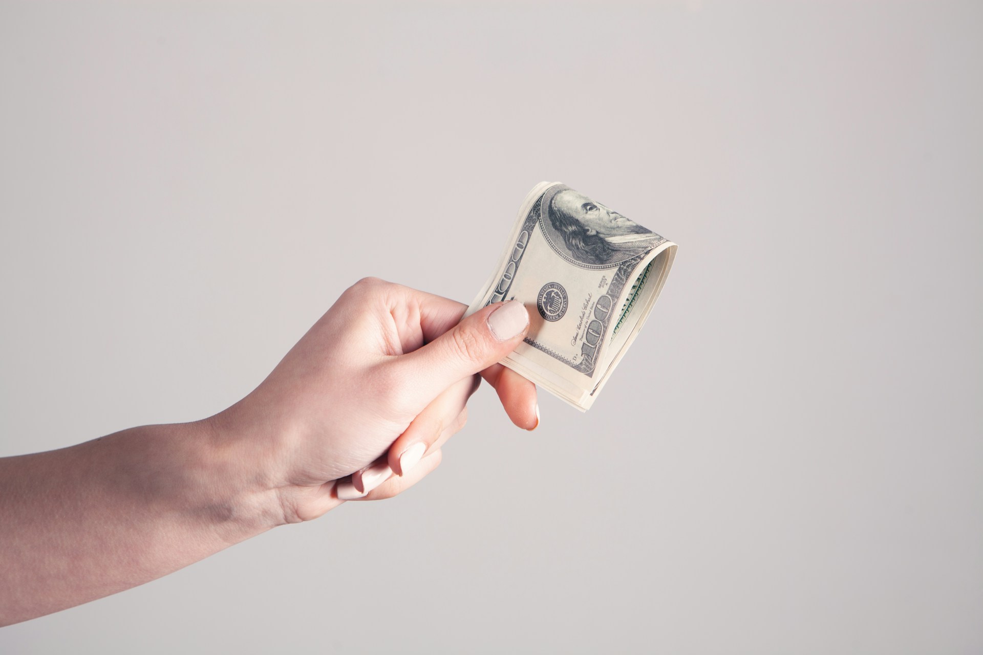 How do I know if someone is scamming me for money?